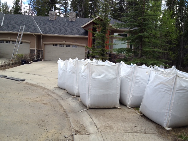 Nervous homeowners take flood mitigation efforts into their own hands - image