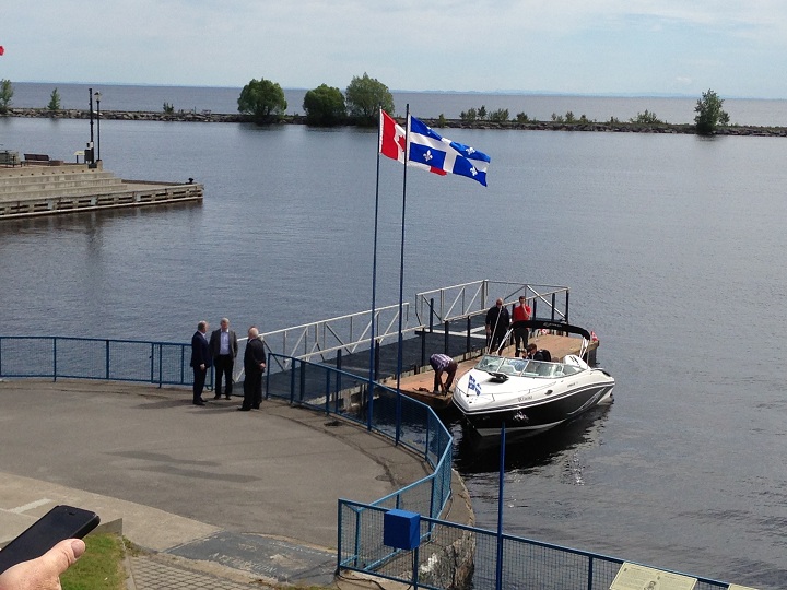 Prime Minister Stephen Harper arrived in Roberval, Que. by boat on June 25, 2014.