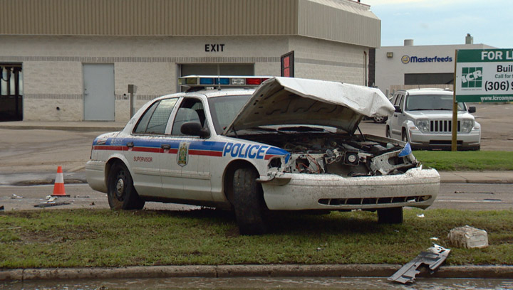 Driver arrested after stolen truck rams Saskatoon police cruiser, collides with several vehicles during afternoon rush hour.