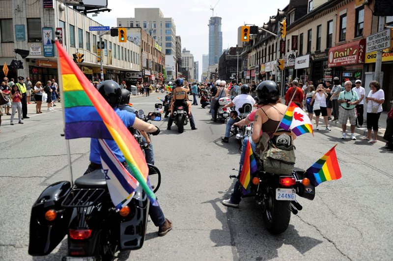 Dykes on Bikes at the Dyke March during Pride, Toronto, Ont., June 29, 2013. THE CANADIAN PRESS IMAGES/Dominic Chan