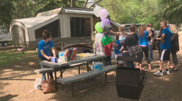 The Make-A-Wish Foundation presents Aiva and her family with a brand new tent trailer.