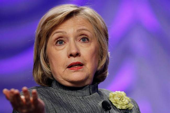 This May 6, 2014 file photo shows Former Secretary of State Hillary Rodham Clinton speaking in National Harbor, Md. 