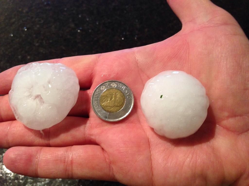 Huge hailstones shattered windows and shredded siding on homes in Airdrie on August 8. 2014.