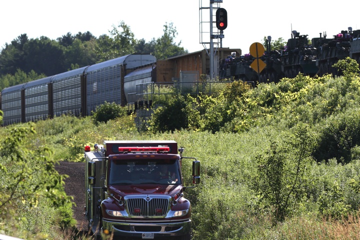 A CN train sits on the train tracks near Brockville, Ont., on Thursday July 10, 2014.