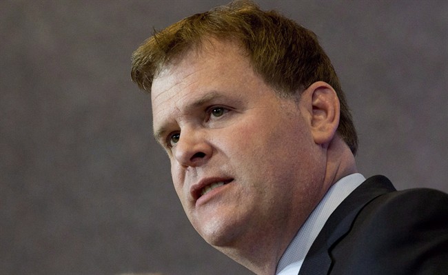 Foreign Affairs Minister John Baird responds to a question at a news conference Friday, May 2, 2014 in Ottawa.