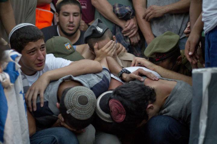 Thousands of people mourned murdered Israeli teens Eyal Yifrah, Gilad Shaar and Naftali Fraenkel