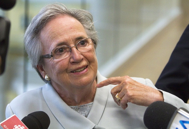 Former lieutenant governor Lise Thibault leaves a courtroom, Monday July 28, 2014 in Quebec city