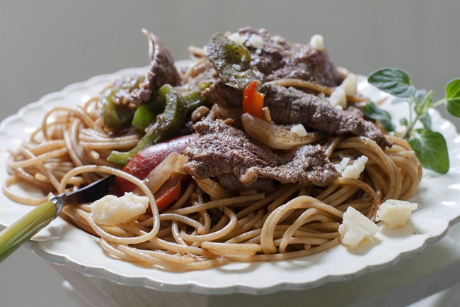 Steak and cheese grinder recast as a pasta dinner