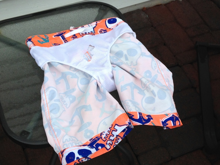 The hole that was cut to free Ronan from his swimming trunks can be seen.