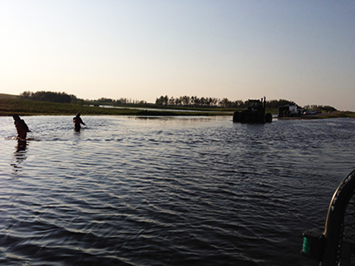 Boy escapes sinking truck, father’s body recovered in Saskatchewan - image