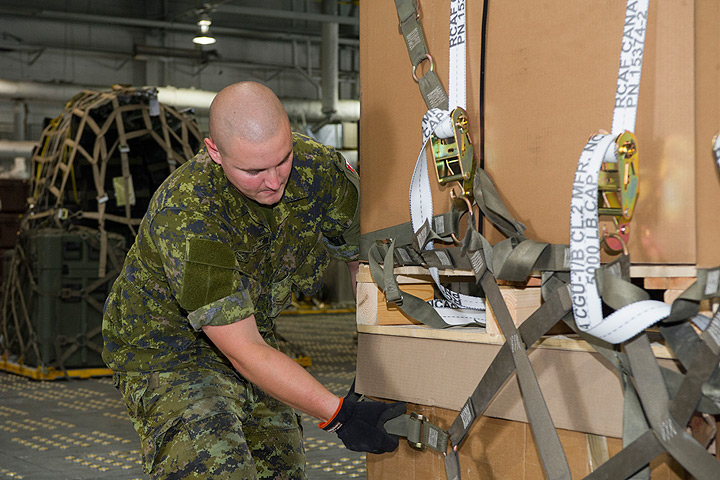 Military material boxes containing non-kinetic military equipment for Ukraine are being prepared by the military personnel of 8 Wing, Canadian Forces Base Trenton, Ontario on August 5, 2014.