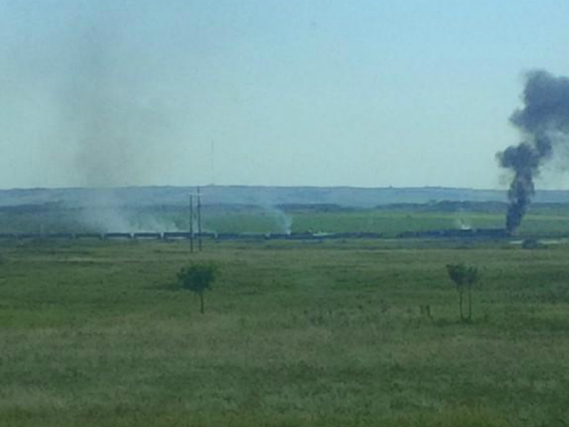 Emergency crews have been called to the scene of a train fire west of Moose Jaw.