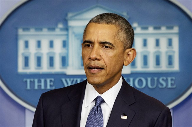 President Barack Obama speaks Friday, Aug. 1, 2014, in the Brady Press Briefing Room of the White House in Washington. 