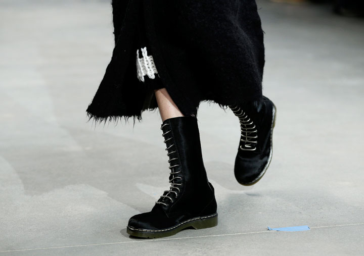 This Feb. 13, 2014 file photo shows an item from the Fall 2014 Calvin Klein collection during Fashion Week in New York. Lucky magazine style editor Laurel Pantin says trends for cooler weather include baby blue outerwear, shearling coats, oversized sweaters, plaids, black-and-white prints, straight trouser pants, hiking boots, blanket coats and Pendleton prints.