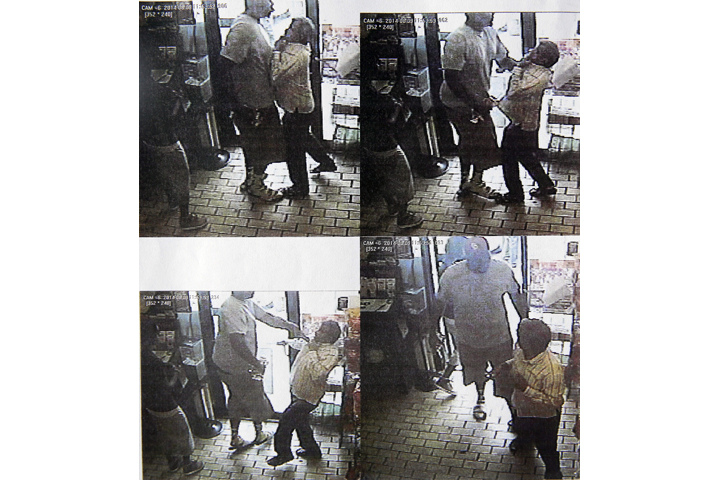 These images provided by the Ferguson Police Department show security camera footage from a convenience store in Ferguson, Mo., on Aug. 9, 2014, the day that Michael Brown was fatally shot by a police officer. A report released Friday, Aug. 15, 2014, by Ferguson Police Chief Thomas Jackson says the footage shows a confrontation between Brown and an employee at the store. (Ferguson Police Department)