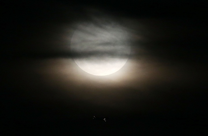 A supermoon rises in the sky on August 10, 2014 in Rio de Janeiro, Brazil.