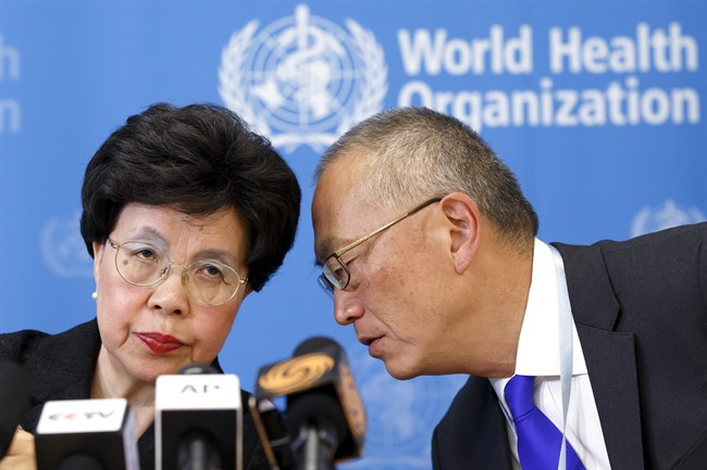 Director General of the World Health Organization, WHO, China\'s Margaret Chan and Assistant Director General for Health Security Keiji Fukuda of the US, right, share a word during a press conference after an emergency meeting at the headquarters of the WHO in Geneva, Switzerland, Friday, Aug. 8, 2014.