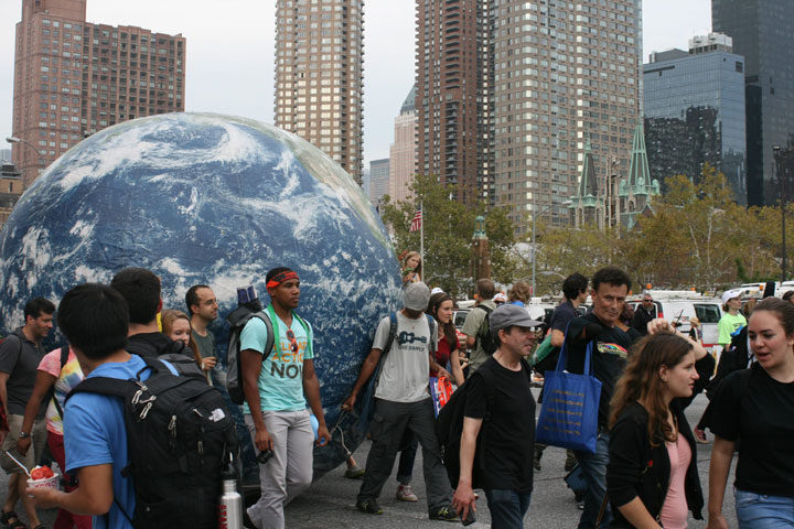 Ahead of a climate summit in New York City, a group of protesters carry a giant globe during the People’s Climate March on September 21, 2014. Similar marches occurred across Canada.