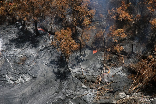 The Hawaiian Volcano Observatory issued a warning Thursday, Sept. 4, 2014 to a rural community in the path of a lava flow on Hawaii's Big Island, as the molten rock moved to within a mile of homes.