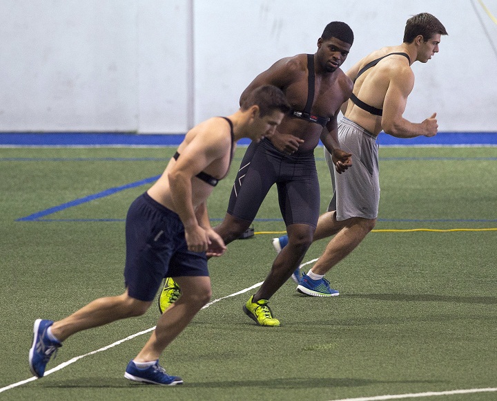 Montreal Canadiens defenceman P. K. Subban, centre, runs with teammates as the team reports for medicals on the first full day of training camp Thursday, September 18, 2014 in Brossard, Que.