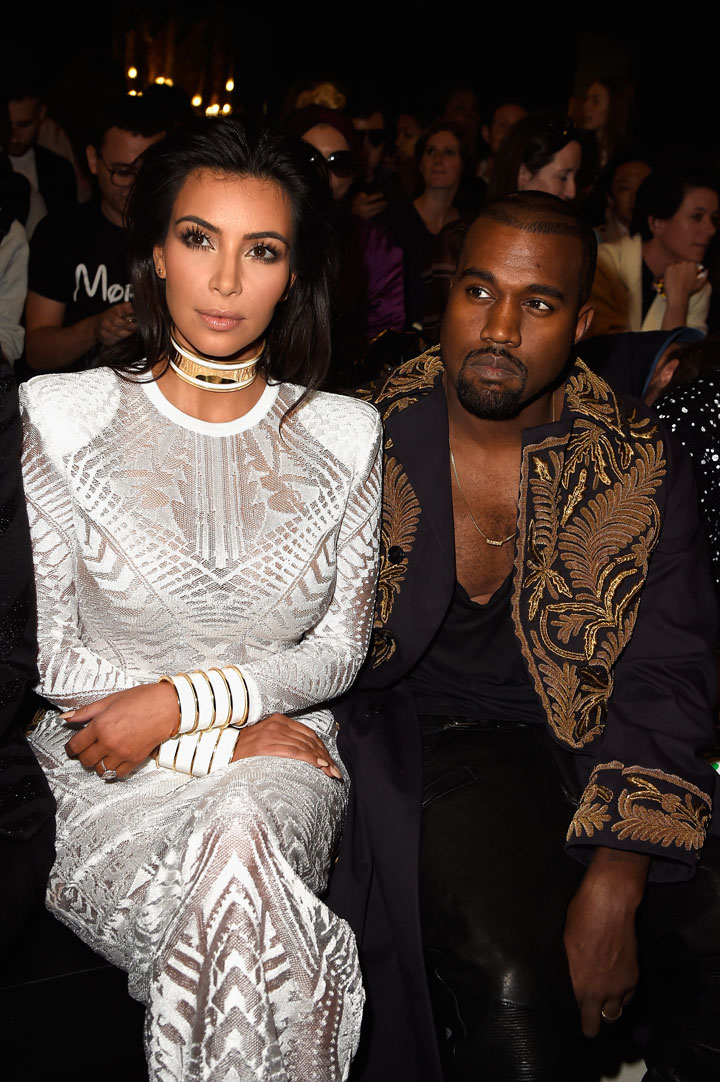 Kim Kardashian and Kanye West attend the Balmain show as part of the Paris Fashion Week Womenswear Spring/Summer 2015 on September 25, 2014 in Paris, France.