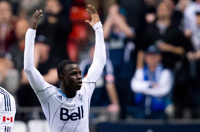 Vancouver Whitecaps' Kekuta Manneh, of Gambia, celebrates.