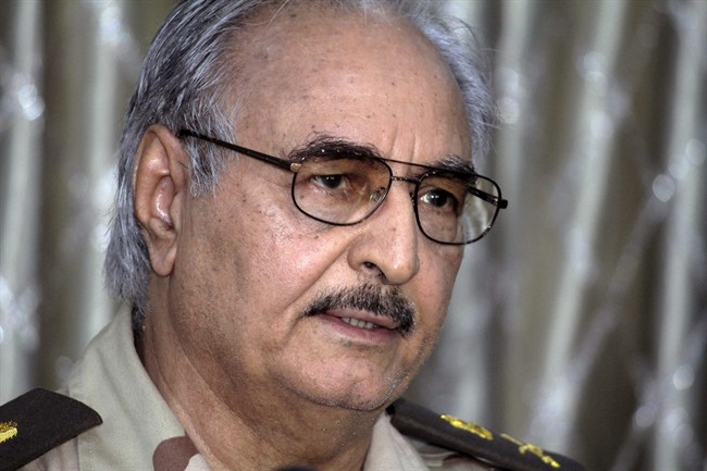 FILE – In this Saturday, May 17, 2014 file photo, Libyan Gen. Khalifa Hifter addresses a press conference in Benghazi, Libya.