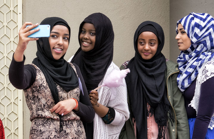 Girls take a selfie during National Mosque open day at the Werribee Islamic Centre in the suburb of Hoppers Crossing on October 25, 2014 in Melbourne, Australia.
