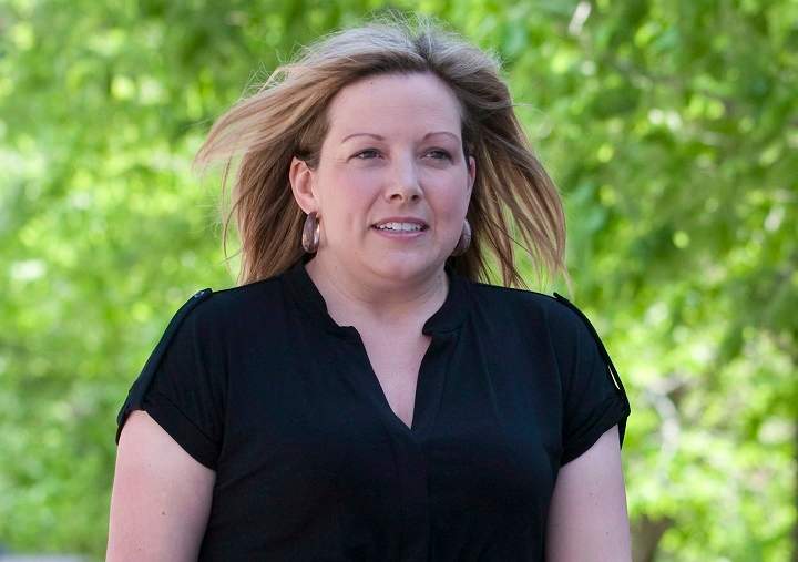 Conservative party staffer Jenni Byrne walks between party headquarters and the Langevin building in Ottawa, Wednesday May 30, 2012. Byrne testified at Luka Rocco Magnotta's first-degree murder trial about opening a parcel and being overwhelmed by a foul odour.