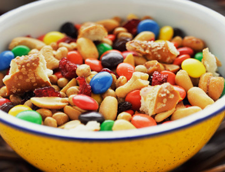 Mix M&M’s, pretzels, nuts, dried fruit and whole grain cereal and oats to make your own trail mix.