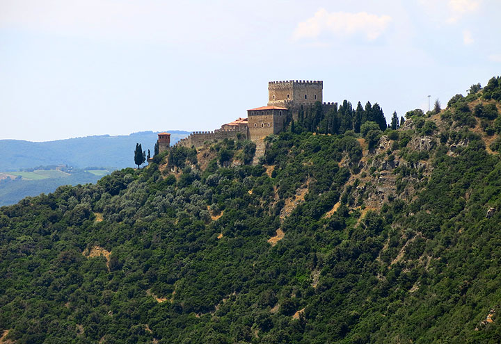 This June 11, 2014 photo shows the castle of Ripa d’Orcia, a medieval castle that is now offers bed-and-breakfast accommodations in Tuscany, Italy. Walking tours of Tuscany offer many scenic and historic spots like this one.