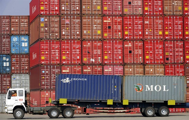 The Pacific Maritime Association said Thursday that the union isn't dispatching enough workers at the twin ports of Los Angeles and Long Beach to load containers efficiently onto trucks and trains. On Monday, the association said crane operators with the International Longshore and Warehouse Union in Washington state are moving cargo at half-speed.