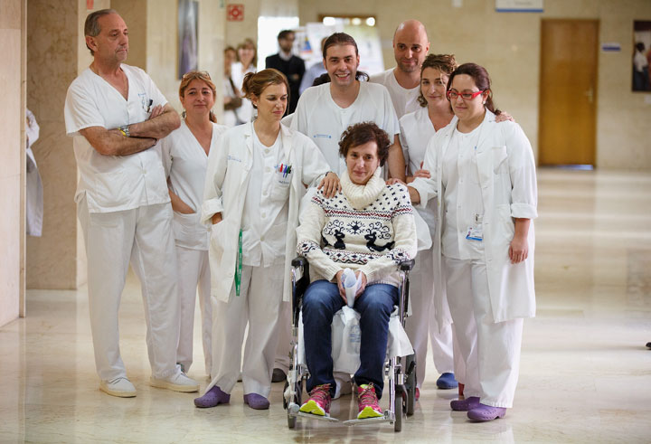 Spanish nurse Teresa Romero (C) poses for photographers as she attends a meeting with the press before she leaves Carlos III Hospital after being discharged on November 5, 2014 in Madrid, Spain. Romero was the first person outside West Africa to contract Ebola when she tested positive on October 6.
