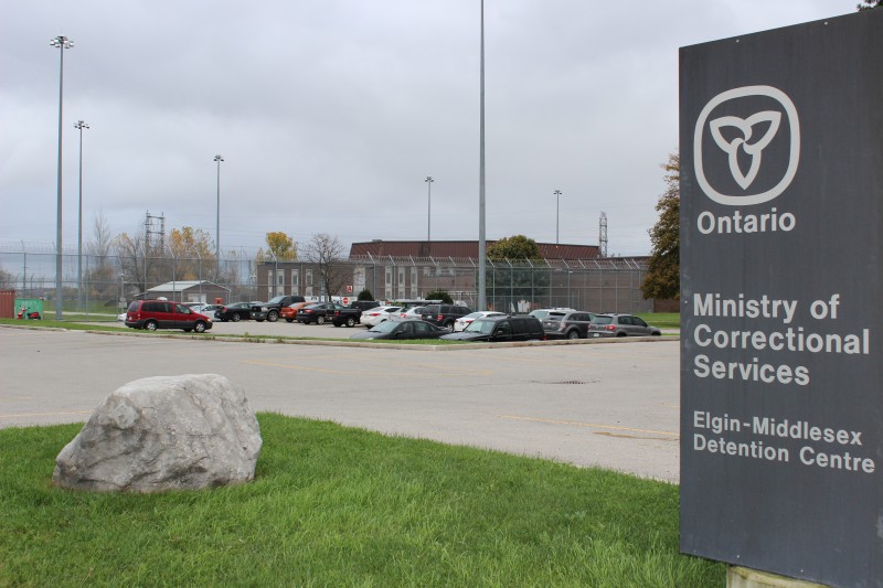Razor wire fence lines the outside of the Elgin-Middlesex Detention Centre, a maximum security prison on Exeter Road, in London, Ont.