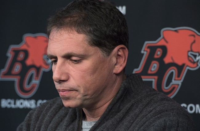 B.C. Lions head coach Mike Benevides pauses for a moment during a news conference at the teams practice facility in Surrey, B.C., on Monday, Nov. 17, 2014. THE CANADIAN PRESS/Jonathan Hayward.