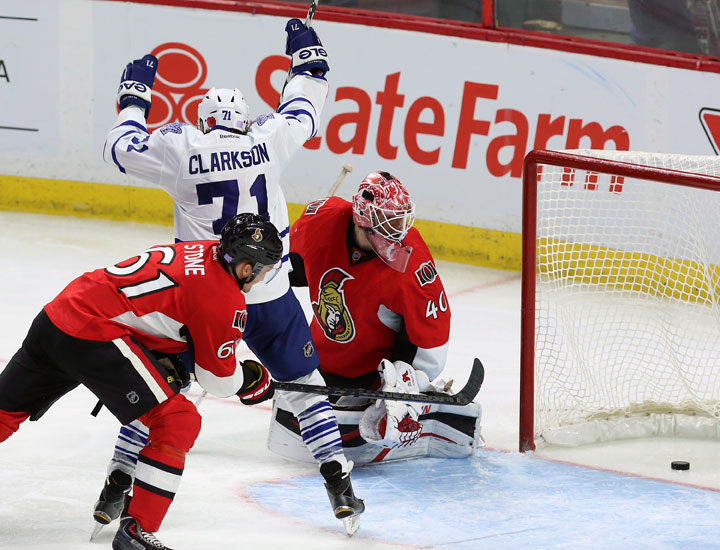 Toronto Maple Leaf David Clarkson celebrates his goal as Ottawa Senator goaltender Robin Lehner (40) looks back to see the puck in his net as teammate Mark Stone (61)looks on during third period NHL hockey between the Ottawa Senators and the Toronto Maple leafs in Ottawa Sunday November 9, 2014. The Maple Leafs defeated Ottawa 5-3.
