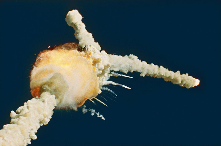 The space shuttle Challenger explodes shortly after lifting off from Kennedy Space Center in this Jan. 28, 1986 file photo.