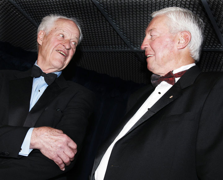 Hockey great Gordie Howe (left) shows Jean Beliveau his elbow (he was famous for elbowing) prior to a charity dinner at the Bell Centre in honour of Beliveau, the former Montreal Canadiens hockey great, in Montreal on March 29, 2007.