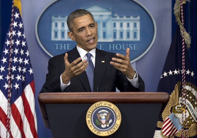 President Barack Obama speaks during a news conference in the Brady Press Briefing Room of the White House in Washington, Friday, Dec. 19, 2014.