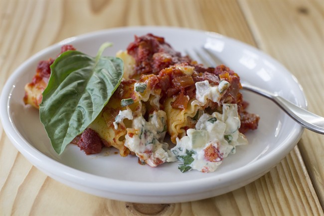 This Nov. 17, 2014 photo shows lobster manicotti fra diavolo in Concord, N.H. If lobster is too much trouble, or not in the budget, just substitute cooked and peeled shrimp. 