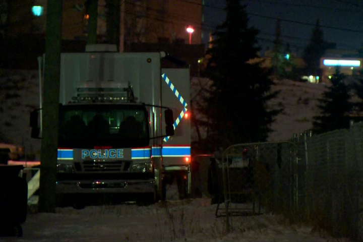 Police at the scene of the ongoing investigation in Ogden Friday night.