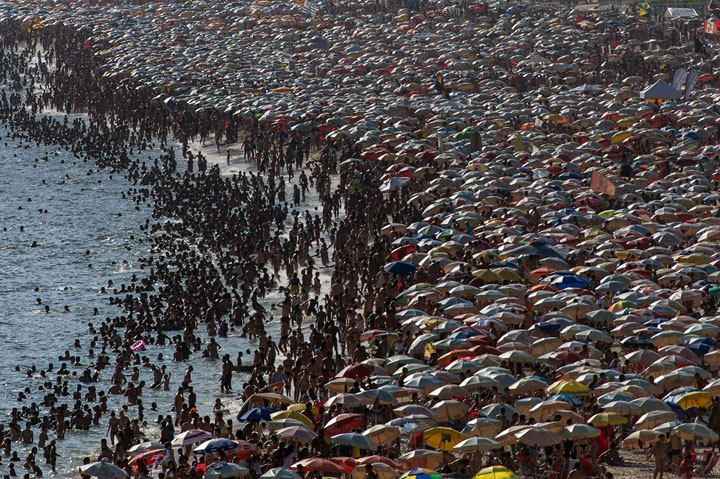 People enjoy Ipanema beach in Rio de Janeiro, Brazil, on January 4, 2014.