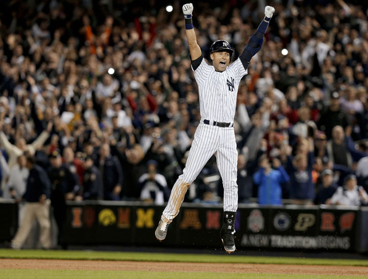 New York Yankee Derek Jeter jumps after hitting the game-winning single against the Baltimore Orioles in the ninth inning of a baseball game, Thursday, Sept. 25, 2014, in New York. It was Jeter’s last home game of his career at Yankee Stadium.