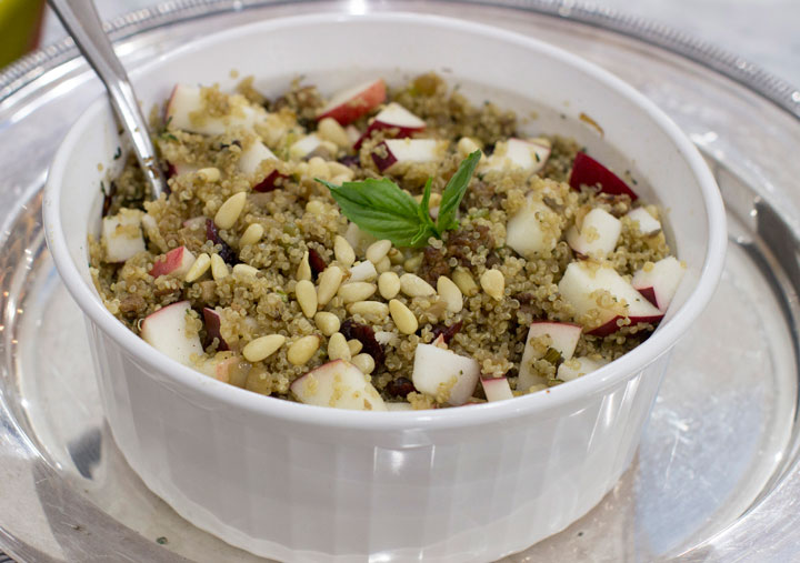 This Dec. 1, 2014, photo shows winter quinoa dressing with apples and dried cranberries in Concord, N.H.