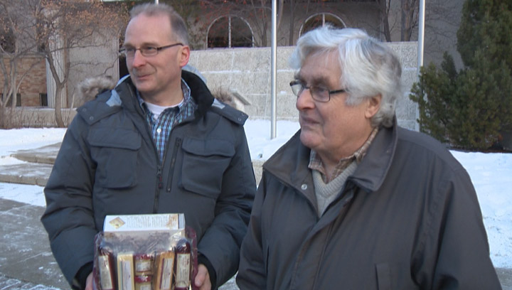 The sound of a snow blower was one reason why Bob Woods (right) nominated his neighbour Glenn Hussey (left) as a “Snow Angel.”