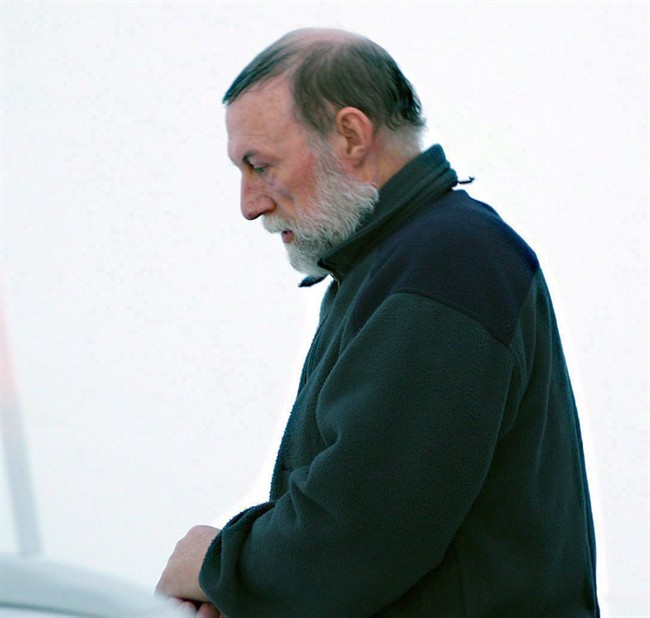 Eric Dejaeger leaves an Iqaluit, Nunavut courtroom Jan. 20, 2011. THE CANADIAN PRESS/Chris Windeyer.