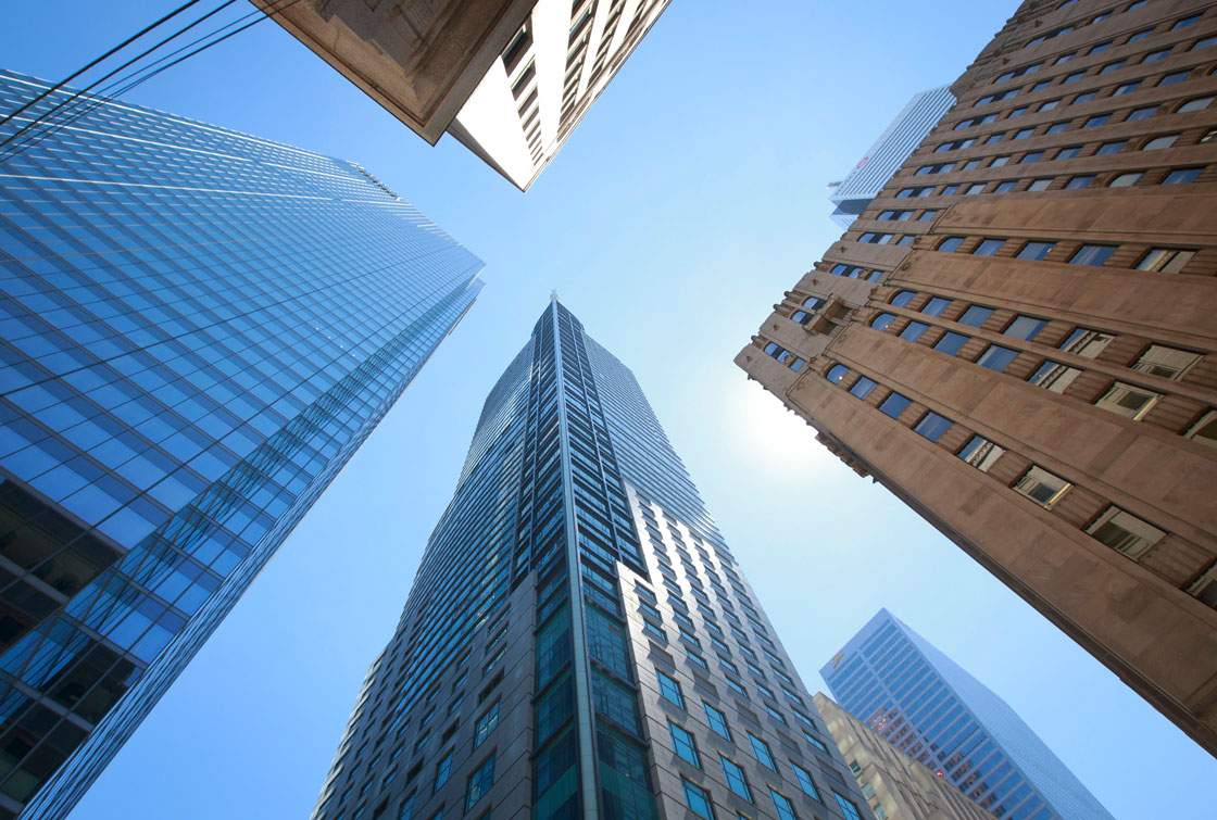 Banks will face pressure as lower oil prices ripple through the economy.
