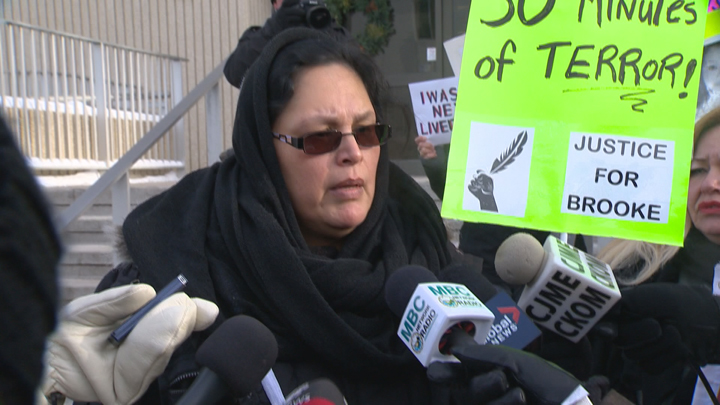 Lisa Dustyhorn was shown the video by the Public Complaints Commissioner and says it shows her daughter, 25 year-old Brooke Watson, being pushed out of a truck by two unknown people. She was not wearing a coat or boots in frigid weather.
