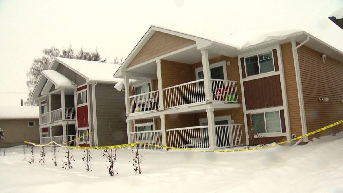 The RCMP Major Crimes Unit cordons off a building in the 100 block of 6th Avenue in Strathmore.