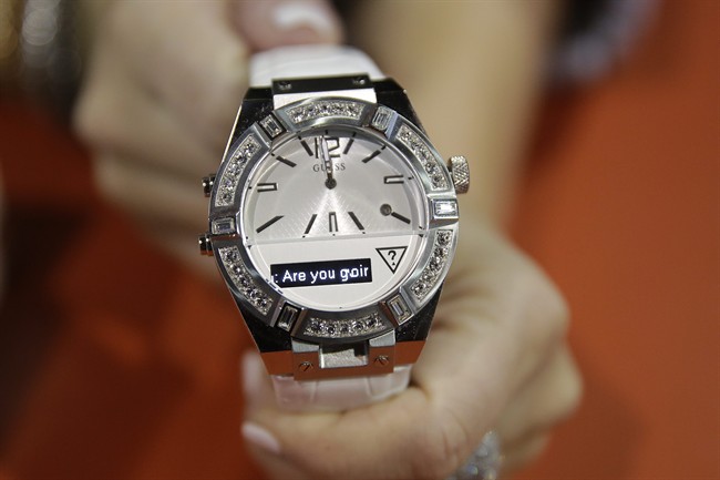 The Guess Connect smartwatch, powered by Martian, is dislpayed at the Martian booth at the International CES Wednesday, Jan. 7, 2015, in Las Vegas. 